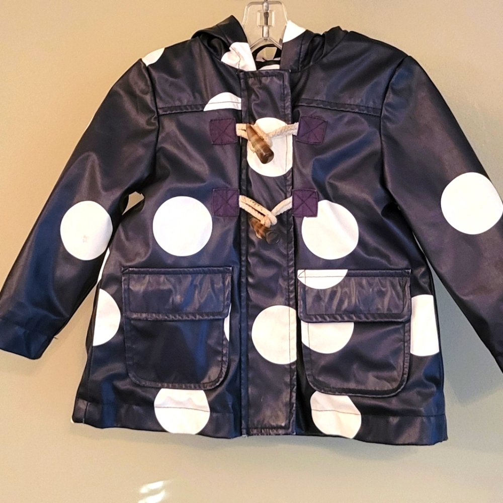Navy polka dot hooded raincoat